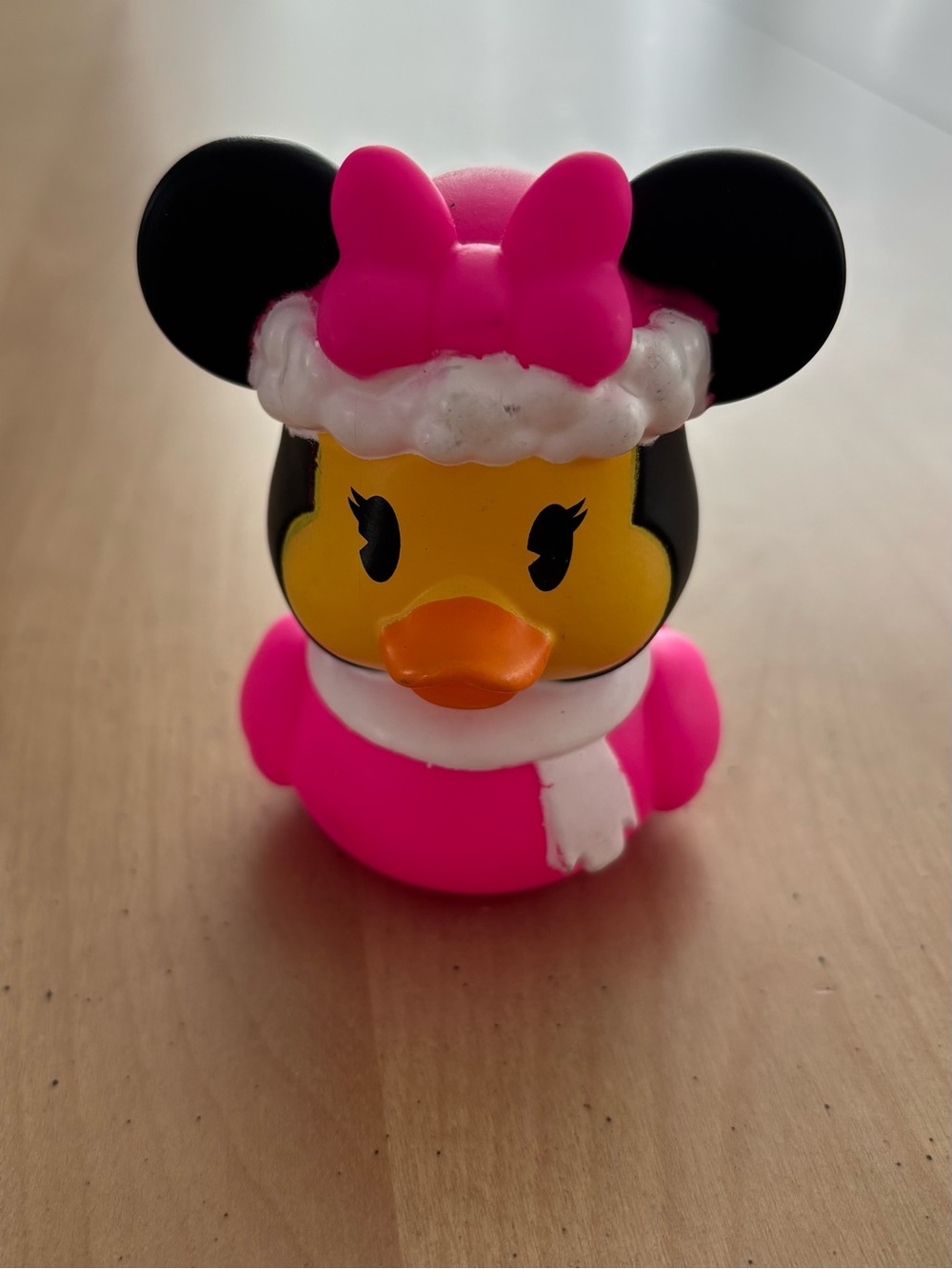The Disney Minnie Mouse Christmas Rubber Duck is a charming holiday collectible